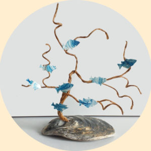 décoration zen bord de mer banc de poissons bleus sur huitre